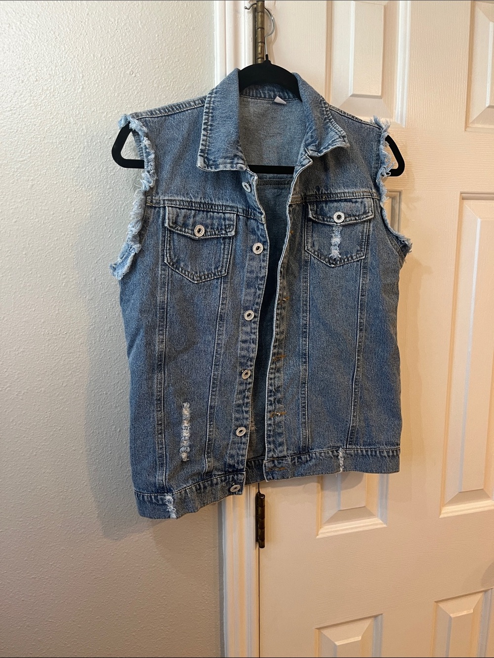 Light Wash Distressed Sleeveless Denim Jacket